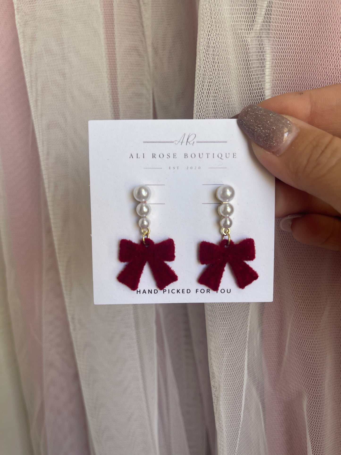 Red bow earrings